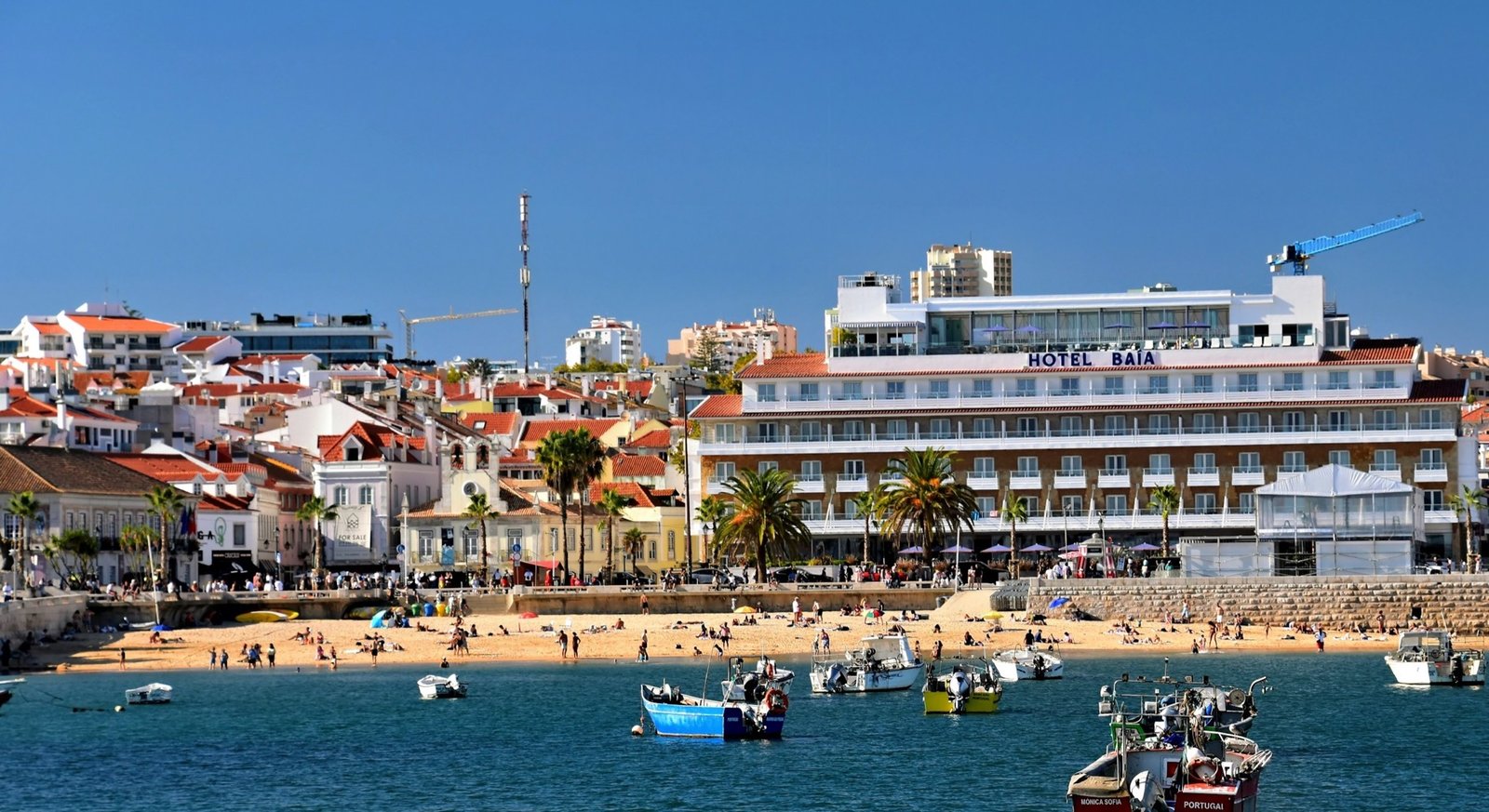 Fishing boats and the waterfront of Cascais Bay