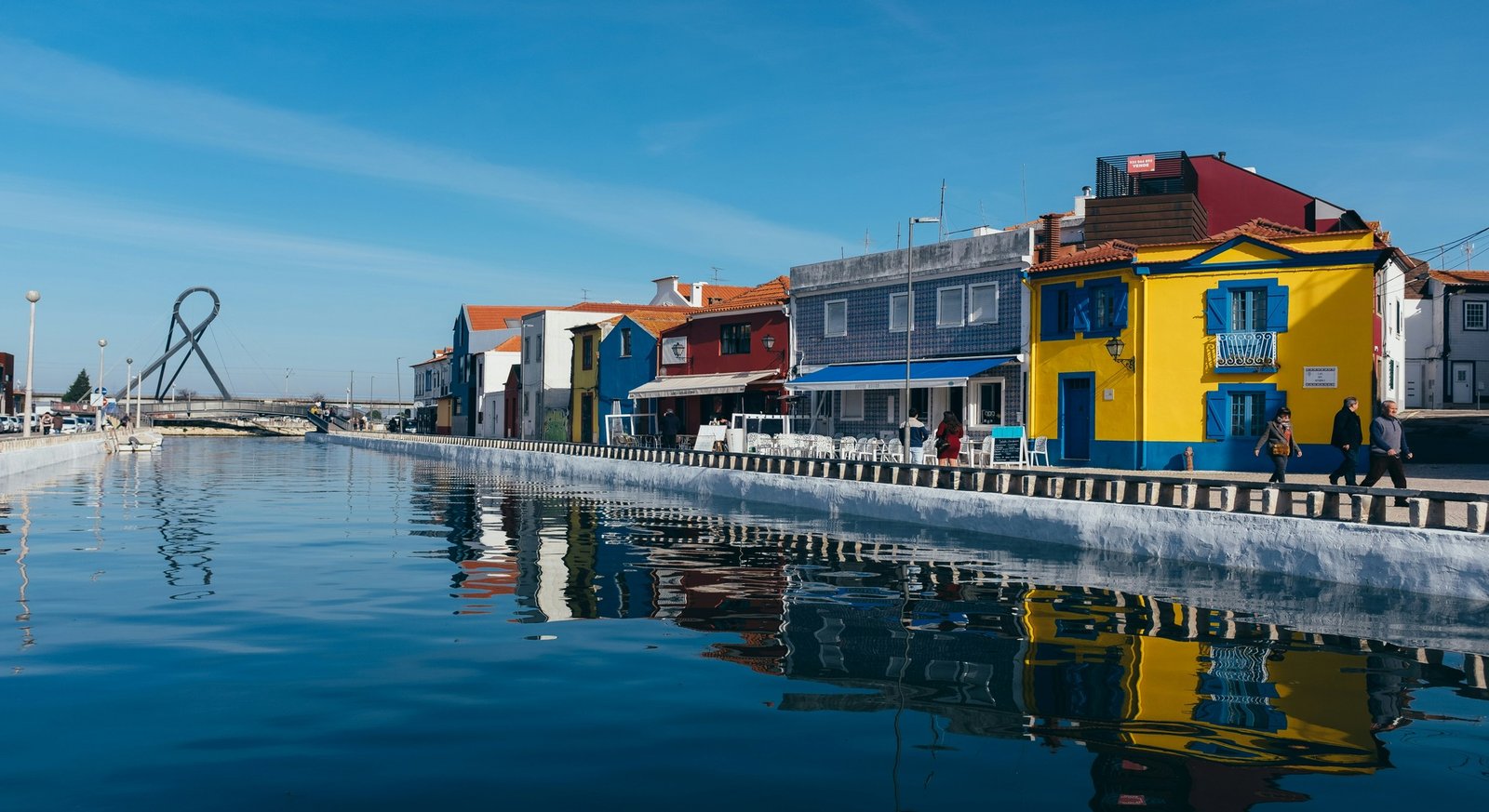 Traditional moliceiro boats moored along the main canal in Aveiro