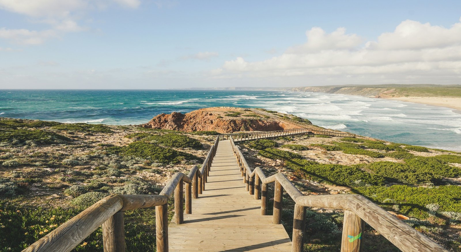 Dramatic golden sea cliffs and turquoise waters of Lagos