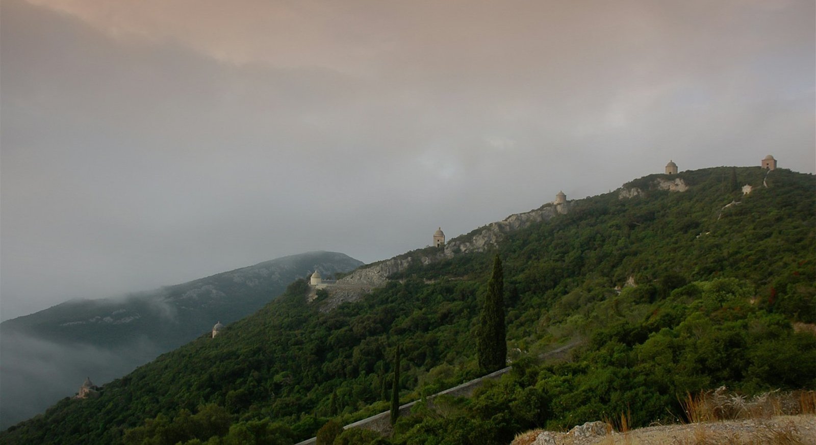 Wooded Arrábida hills and historic convent chapels