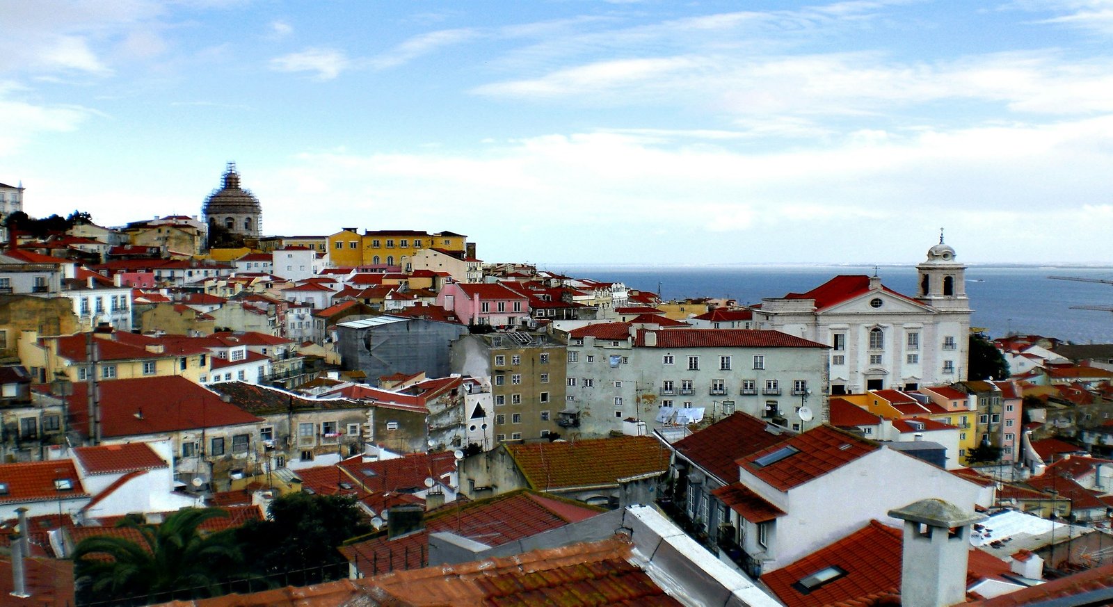 Winding medieval alleyways of the historic Alfama Judiaria in Lisbon