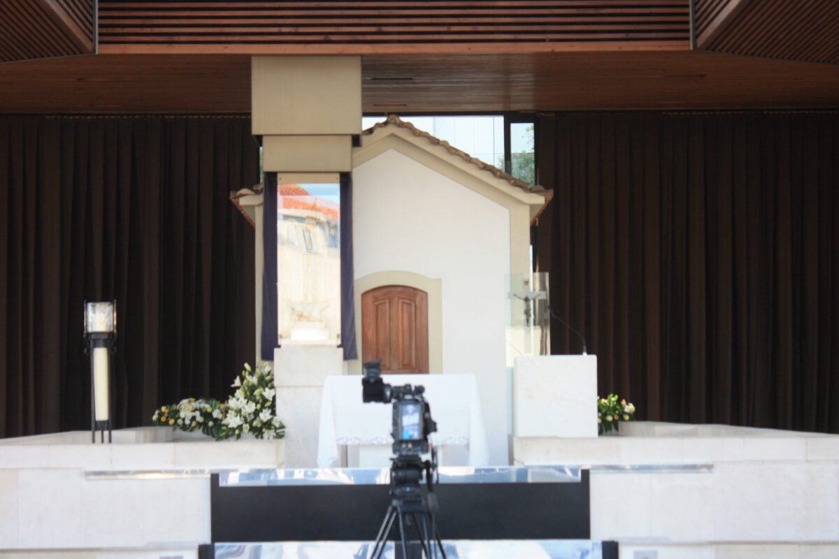 The small Chapel of the Apparitions beneath the sanctuary’s large covered roof.