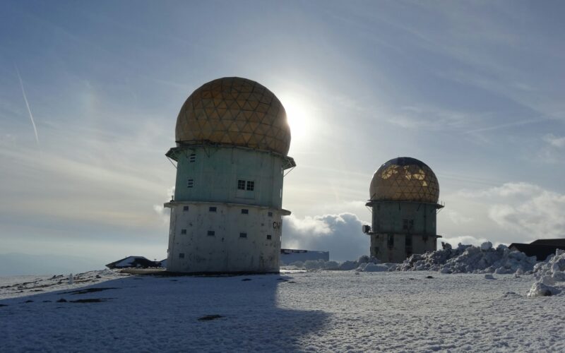 Two domed towers surrounded by snow in Serra da Estrela