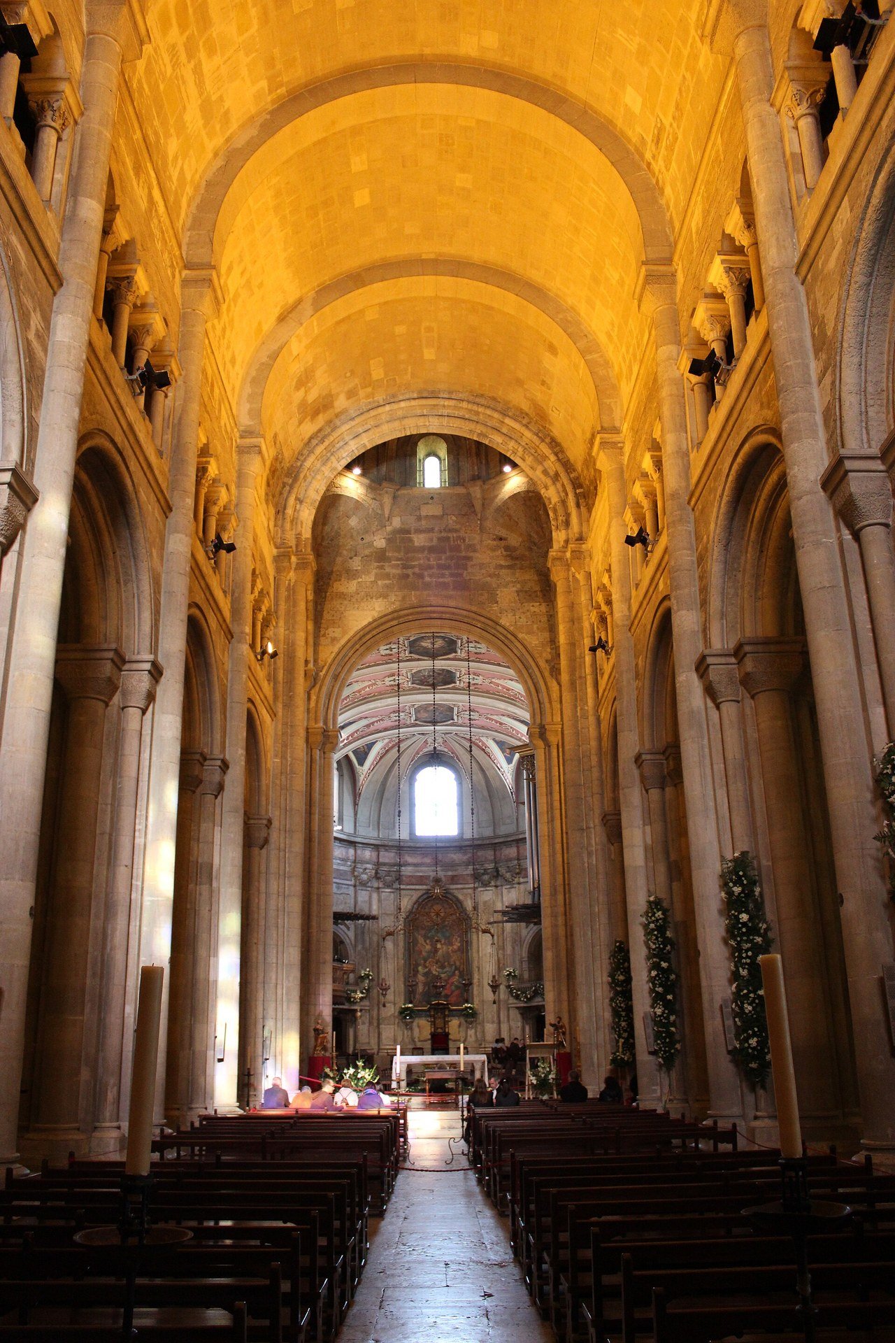 Central nave and stone arches inside Lisbon Cathedral