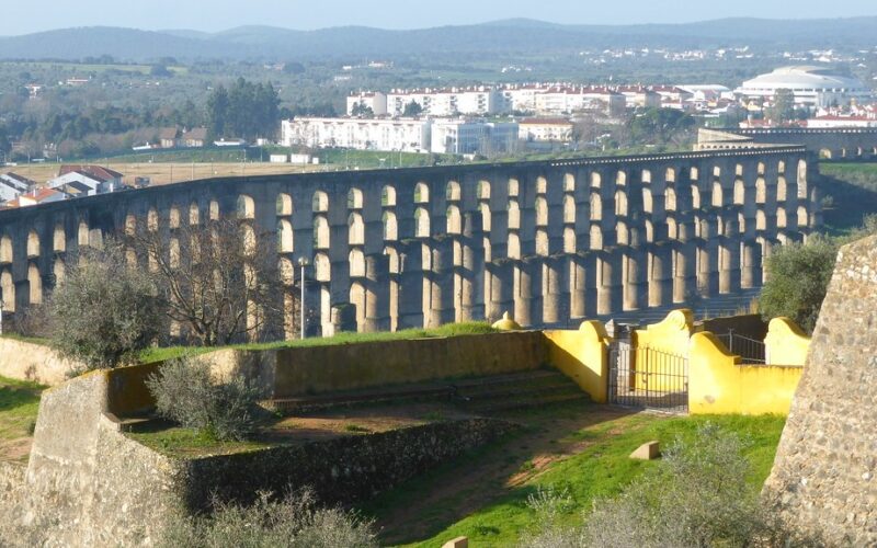 Stone arches of the Amoreira Aqueduct beside Elvas