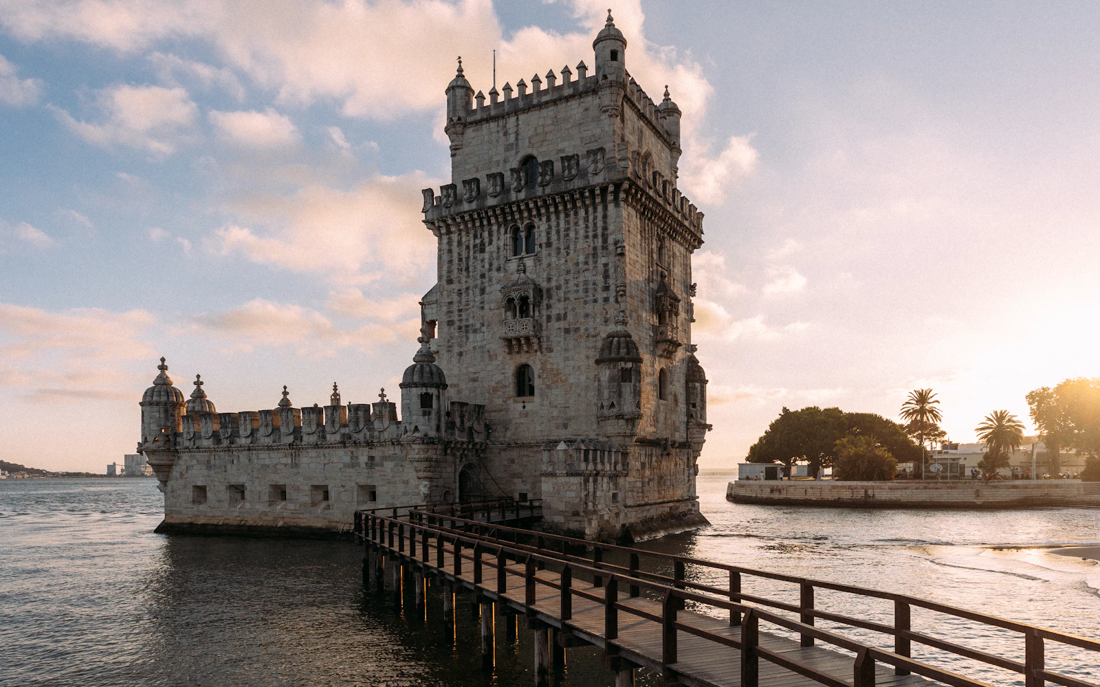 Iconic Belém Tower standing beside the Tagus River in Lisbon